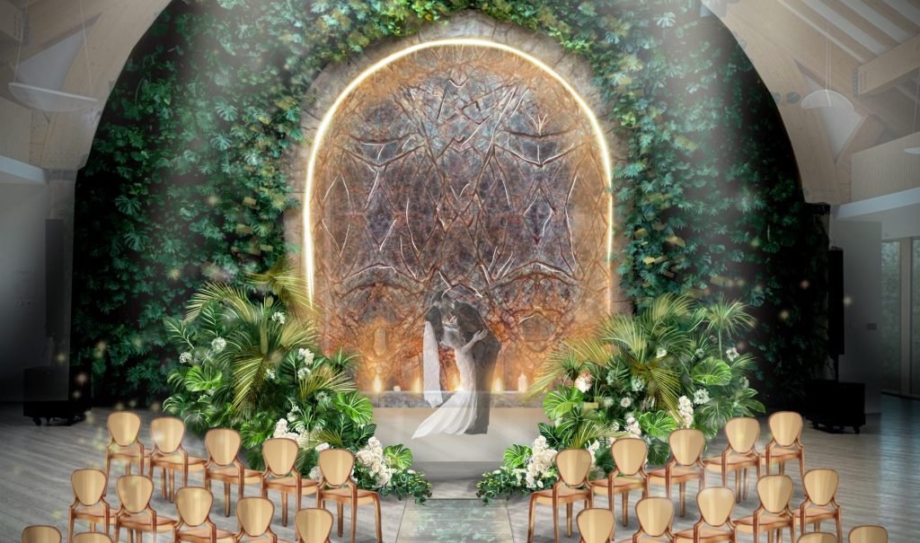 vestuviu ceremonijos vieta su zaliuojancia arka
